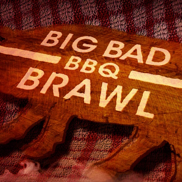 A wooden cutting board shaped like a bull with "BIG BAD BBQ BRAWL" carved into it.