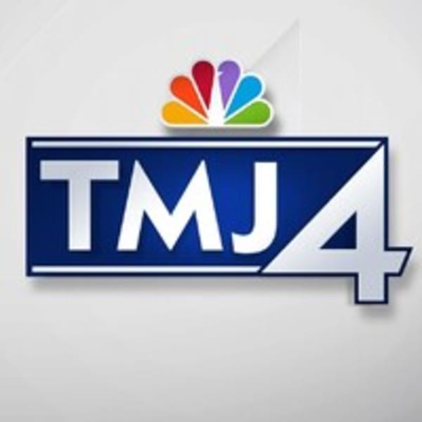 TMJ4 logo, a blue rectangle with white text "TMJ4" and the NBC peacock above it.